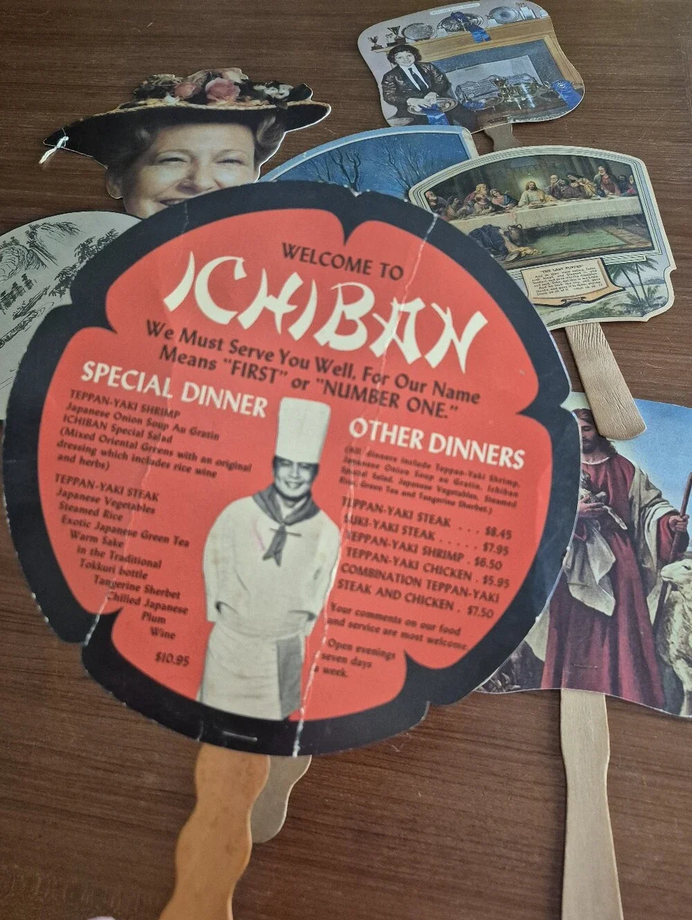 Assorted vintage advertising fans